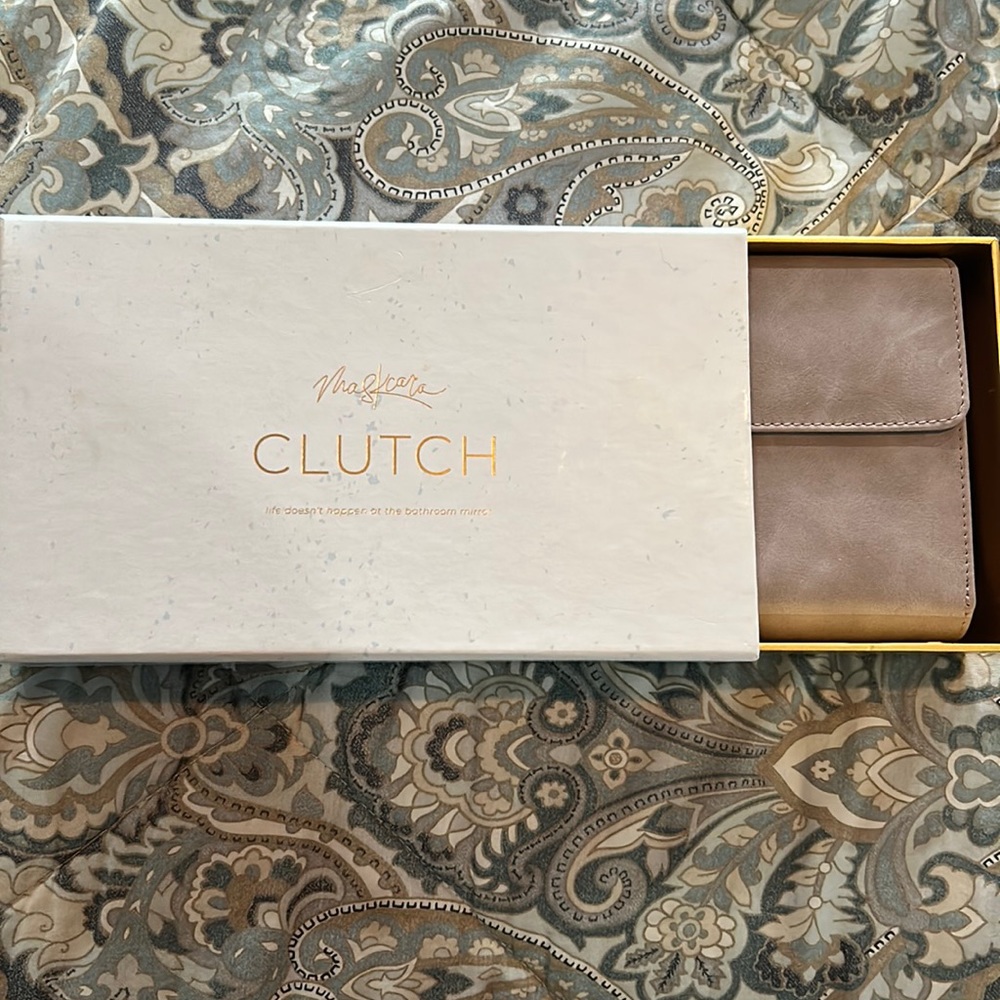 Brand New in box SEINT (Maskcara) clutch